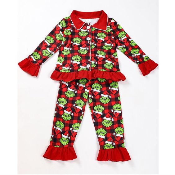 Dress your baby in mischievous charm with Baby Grinch Pajamas. Festive, cozy, and playful, these pajamas will bring a smile to every face this holiday season. Unleash the cute Grinch in your child!